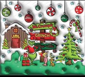 Whimsical Grinch holiday scene with Christmas tree, hanging ornaments, and festive decorations.