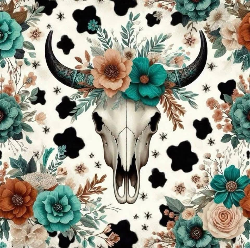 Decorative design with a cow skull surrounded by colorful flowers and leaves on a white background.