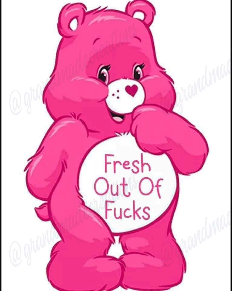 Pink cartoon bear holding a white circle reading Fresh Out Of Fucks.