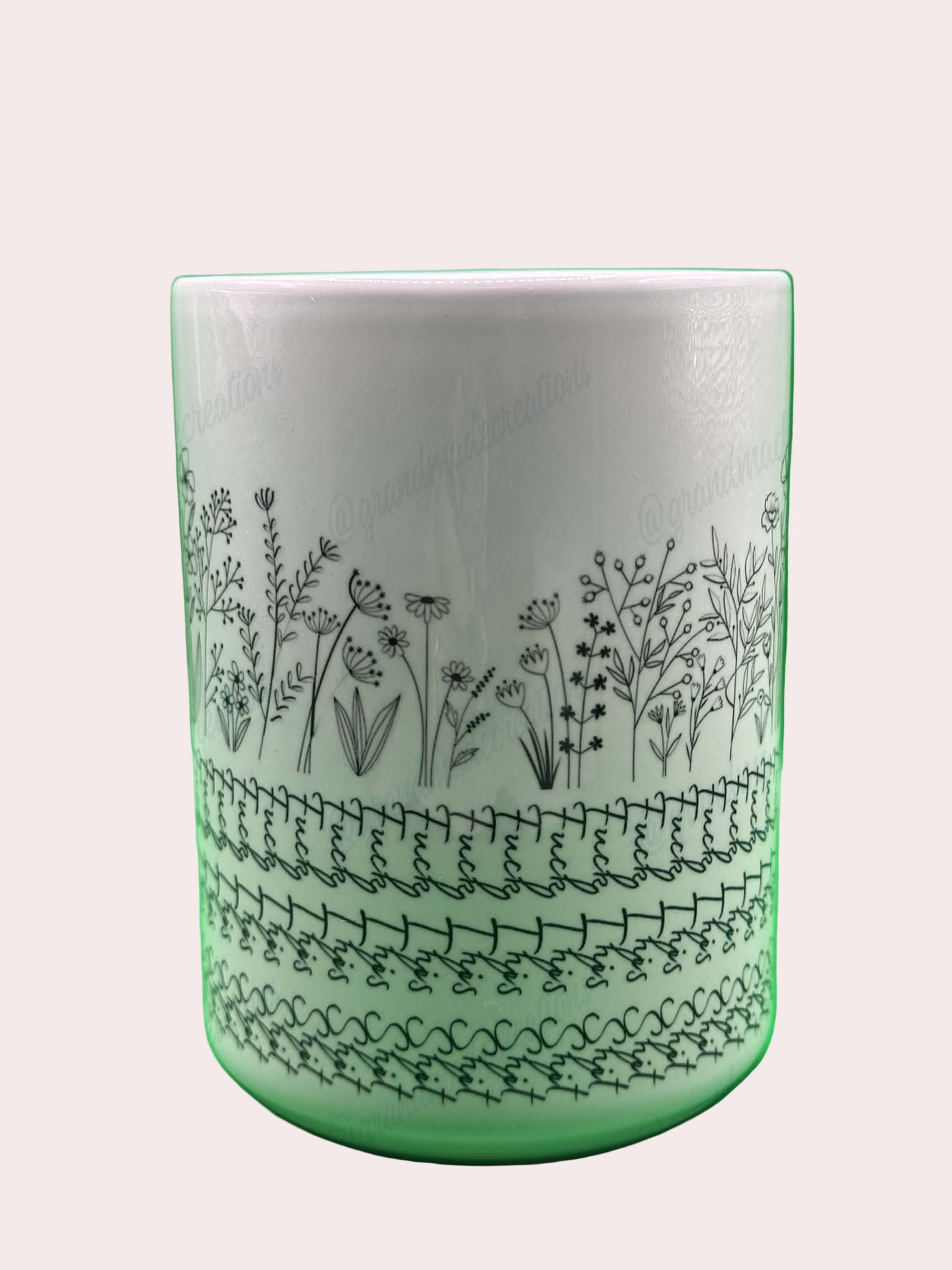 White ceramic tumbler with black floral and musical note design with the words Fuck this Shit