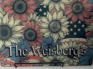 11x8 tempered glass cutting board with sunflower and American flag motif.